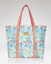 Your passport to style, this Lilly Pulitzer tote travels through time with a sparkling print saluting decades of design. Your passport to style, this Lilly Pulitzer tote travels through time with a sparkling print saluting decades of design.
