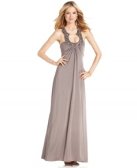 A dazzling jeweled neckline is the eye-catching element on JS Boutique's gorgeous evening gown. Pleating at the bust and back ensures a flattering fit as the dress flares toward the hem. A dazzling jeweled neckline is the eye-catching element on JS Boutique's gorgeous evening gown. Pleating at the bust and back ensures a flattering fit as the dress flares toward the hem.