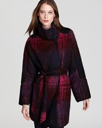 Go dark and decadent in an oversized BASLER coat, brushed with a rich plaid pattern and cinched at the waist for a modern feminine statement. Go dark and decadent in an oversized BASLER coat, brushed with a rich plaid pattern and cinched at the waist for a modern feminine statement.