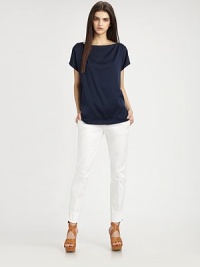 Form-fitting staple has four-pocket styling and skinny-leg construction. Hook-and-eye closureZip flySlash pocketsBack besom pocketsInseam, about 2598% cotton/2% spandexDry cleanMade in USA of Italian fabricModel shown is 5'10 (177cm) wearing US size 2. Form-fitting staple has four-pocket styling and skinny-leg construction. Hook-and-eye closureZip flySlash pocketsBack besom pocketsInseam, about 2598% cotton/2% spandexDry cleanMade in USA of Italian fabricModel shown is 5'10 (177cm) wearing US size 2.