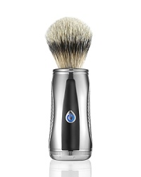 The Power Shave Collection Pure Badger Power Brush, a first of its kind worldwide, lifts the beard with powered oscillations for a close and comfortable shave. Using advanced technology to modernize the wet shave tradition and enhance the lathering experience. The precise motion generates a rich, moisturizing lather into the hair to protect the skin. Ergonomically designed with a micro-textured surface for style and grip, the handle is elegantly handcrafted in polished chrome with black lacquered accents. The Power Shave Collection Pure Badger Power Brush, a first of its kind worldwide, lifts the beard with powered oscillations for a close and comfortable shave. Using advanced technology to modernize the wet shave tradition and enhance the lathering experience. The precise motion generates a rich, moisturizing lather into the hair to protect the skin. Ergonomically designed with a micro-textured surface for style and grip, the handle is elegantly handcrafted in polished chrome with black lacquered accents.