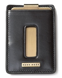 Wrought in quality burnished leather and brushed steel, this slim money clip features a logo plaque on the front and a clip on the back.