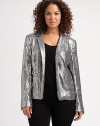 Allover sequins add stunning appeal to this fashion staple. Dress this glamorous blazer down with your dark-denim jeans.Notched collarLong sleevesFront pocketsBack princess seamsAbout 23 from shoulder to hemPolyesterDry cleanImported