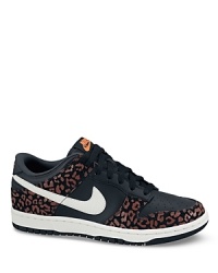 A classic basketball silhouette goes wild in these Nike sneakers, right on pace with the exotics trend. A classic basketball silhouette goes wild in these Nike sneakers, right on pace with the exotics trend.