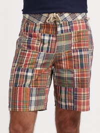 An allover patchwork design is highlighted by handsome plaid patterns on this preppy, classic-fitting swim trunk.Drawstring tie waistZip flySide slash, back patch pocketsInseam, about 8½52% cotton/48% nylonMachine washImported An allover patchwork design is highlighted by handsome plaid patterns on this preppy, classic-fitting swim trunk.Drawstring tie waistZip flySide slash, back patch pocketsInseam, about 8½52% cotton/48% nylonMachine washImported