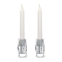 Inspired by a celebrated design of George Chevalier in the 1930s, Thomas Bastide's diamond-cut candlesticks feature interior ruffle cuts to maximize light dispersion. Inspired by a celebrated design of George Chevalier in the 1930s, Thomas Bastide's diamond-cut candlesticks feature interior ruffle cuts to maximize light dispersion.