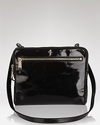 Slim and slick. This leather crossbody bag from Cole Haan encapsulates easy, on-the-go style with space for your iPad, and an exterior pocket for the grab-and-go essentials. Slim and slick. This leather crossbody bag from Cole Haan encapsulates easy, on-the-go style with space for your iPad, and an exterior pocket for the grab-and-go essentials.