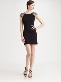 Lined, floral lace cap sleeves dress up this sleek, ultra-feminine design.Jewel necklineLined lace cap sleevesConcealed back zipAbout 18 from natural waist74% rayon/23% nylon/3% spandexDry cleanMade in USA of imported fabricModel shown is 5'10½ (179cm) wearing US size 2. Lined, floral lace cap sleeves dress up this sleek, ultra-feminine design.Jewel necklineLined lace cap sleevesConcealed back zipAbout 18 from natural waist74% rayon/23% nylon/3% spandexDry cleanMade in USA of imported fabricModel shown is 5'10½ (179cm) wearing US size 2.
