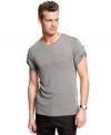 Roll up your sleeves and get to work looking stylish this season with this t-shirt from Calvin Klein.