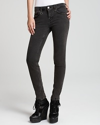 A faded grey finish lends a punk-edge finish to sleek Burberry Brit skinny jeans. Amp up the silhouette with chunky booties and rock n' roll to the top of the fashion set. A faded grey finish lends a punk-edge finish to sleek Burberry Brit skinny jeans. Amp up the silhouette with chunky booties and rock n' roll to the top of the fashion set.