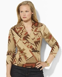 A serape-inspired pattern adds heritage appeal to a soft shawl-collar cardigan, rendered in soft cotton with a faux-leather buckle at the side. A serape-inspired pattern adds heritage appeal to a soft shawl-collar cardigan, rendered in soft cotton with a faux-leather buckle at the side.