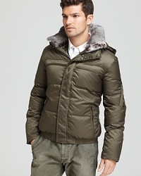 Neutralize the cold in this super-warm coat, insulated completely with down feathers and featuring a fur-lined collar for a touch of modern luxury. Neutralize the cold in this super-warm coat, insulated completely with down feathers and featuring a fur-lined collar for a touch of modern luxury.
