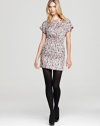 A ladylike BCBGeneration dress, cinched at the waist for a classically feminine silhouette boasts a subtle open cutout in back for added allure. A ladylike BCBGeneration dress, cinched at the waist for a classically feminine silhouette boasts a subtle open cutout in back for added allure.