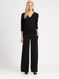 Beautifully beaded, this merino wool sweater features a feminine, draped neckline and modern elbow-length sleeves.Draped necklineElbow-length sleevesPull-on styleAbout 24 from shoulder to hemMerino woolDry cleanImported of Italian fabricSIZE & FIT Model shown is 5'10½ (179cm) wearing a US size Small. Beautifully beaded, this merino wool sweater features a feminine, draped neckline and modern elbow-length sleeves.Draped necklineElbow-length sleevesPull-on styleAbout 24 from shoulder to hemMerino woolDry cleanImported of Italian fabricSIZE & FIT Model shown is 5'10½ (179cm) wearing a US size Small.