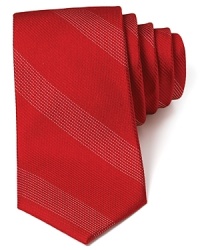Bold color makes a striking statement with this handsome and regal silk tie, cut in a classic width for a traditional appeal. Bold color makes a striking statement with this handsome and regal silk tie, cut in a classic width for a traditional appeal.