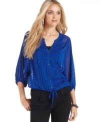 This rich, textured peasant top from DKNY Jeans features semi-sheer fabric for a boho vibe. This rich, textured peasant top from DKNY Jeans features semi-sheer fabric for a boho vibe.