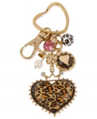Betsey Johnson makes a heartfelt gesture with this key chain. Crafted from antique gold-tone mixed metal, the key chain features glass and glitter accents, as well as a leopard pattern heart to make it truly one to love. Item comes packaged in a signature Betsey Johnson Gift Box. Approximate drop: 1-3/4 inches. Betsey Johnson makes a heartfelt gesture with this key chain. Crafted from antique gold-tone mixed metal, the key chain features glass and glitter accents, as well as a leopard pattern heart to make it truly one to love. Item comes packaged in a signature Betsey Johnson Gift Box. Approximate drop: 1-3/4 inches.