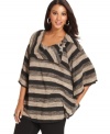 Stay warm and on-trend this season in AGB's striped plus sweater-- it's a must-have!