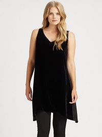 Pull on this unbelievably soft, machine-washable velvet dress with a fit that will surely flatter your figure. V-neckSleevelessHandkerchief hemPull-on styleAbout 40 from shoulder to hemRayon/silkMachine washImported Pull on this unbelievably soft, machine-washable velvet dress with a fit that will surely flatter your figure. V-neckSleevelessHandkerchief hemPull-on styleAbout 40 from shoulder to hemRayon/silkMachine washImported