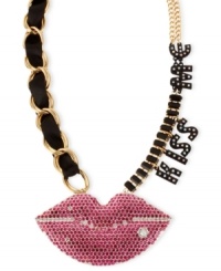 Seal it with a kiss. Betsey Johnson's Kiss Me necklace, crafted from gold-tone mixed metal, features black and fuchsia glass accents, as well as black ribbon and stones, to make an affectionate statement. Approximate length: 19 inches + 3-inch extender. Approximate drop: 2 inches. Seal it with a kiss. Betsey Johnson's Kiss Me necklace, crafted from gold-tone mixed metal, features black and fuchsia glass accents, as well as black ribbon and stones, to make an affectionate statement. Approximate length: 19 inches + 3-inch extender. Approximate drop: 2 inches.