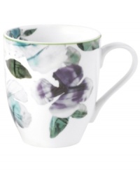 Watercolor florals adorn the canvas of white porcelain that is Mikasa's Paradise Bloom mug. A simple silhouette and band of green complete this essential part of the everyday dinnerware collection. Watercolor florals adorn the canvas of white porcelain that is Mikasa's Paradise Bloom mug. A simple silhouette and band of green complete this essential part of the everyday dinnerware collection.
