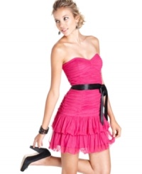 Prom or homecoming will always be memorable in this super-glam strapless dress by Hailey Logan! Fun ruching and ruffles show off your feminine side, while the black ribbon belt adds some edge to your look. Prom or homecoming will always be memorable in this super-glam strapless dress by Hailey Logan! Fun ruching and ruffles show off your feminine side, while the black ribbon belt adds some edge to your look.