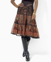 Lauren Ralph Lauren's artistic paisley pattern replete with vibrant florals creates a bold statement on the flowing tiered silhouette of this enchanting silk skirt. Lauren Ralph Lauren's artistic paisley pattern replete with vibrant florals creates a bold statement on the flowing tiered silhouette of this enchanting silk skirt.