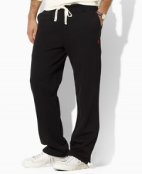 A classic-fitting drawstring pant in soft fleece is designed for casual comfort and style.