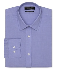 Dress shirt with spread collar, two button barrel cuffs and a contemporary fit through the body, with a blue check pattern. Dress shirt with spread collar, two button barrel cuffs and a contemporary fit through the body, with a blue check pattern.