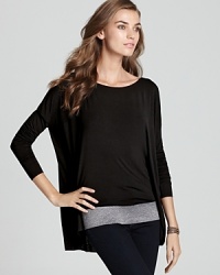 A smooth and slinky Bailey 44 top with of-the-moment color blocking near the hem. A smooth and slinky Bailey 44 top with of-the-moment color blocking near the hem.