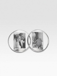 This gorgeous double frame uses the classic symbolism of joined circles, and makes the perfect wedding or anniversary gift.Metal & glassHolds two 5 x 7 photosImported This gorgeous double frame uses the classic symbolism of joined circles, and makes the perfect wedding or anniversary gift.Metal & glassHolds two 5 x 7 photosImported