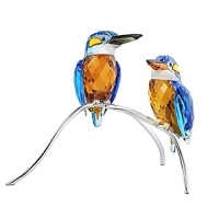 The boldly colorful pair of kingfisher birds in Blue Turquoise, Aquamarine, Sun and clear crystal are elegantly perched on a silvertone metal stand. They were created with approximately 20 separate parts. The boldly colorful pair of kingfisher birds in Blue Turquoise, Aquamarine, Sun and clear crystal are elegantly perched on a silvertone metal stand. They were created with approximately 20 separate parts.