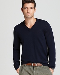 A handsome stand-alone staple or a great layering piece for when the temperature drops, this classic V-neck sweater from BOSS Orange is essential versatility defined. A handsome stand-alone staple or a great layering piece for when the temperature drops, this classic V-neck sweater from BOSS Orange is essential versatility defined.