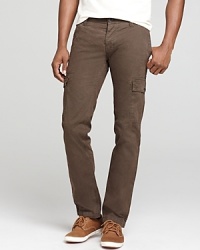 Casual cool cargo pants are updated with a slim fit for your modern wardrobe, an ideal complement to handsome button-downs and designer tees. Casual cool cargo pants are updated with a slim fit for your modern wardrobe, an ideal complement to handsome button-downs and designer tees.