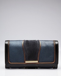 An always essential, this compact Burberry bi-fold wallet secures with a snap and opens to a surprisingly spacious interior with 14 credit card pockets and one zip pocket. An always essential, this compact Burberry bi-fold wallet secures with a snap and opens to a surprisingly spacious interior with 14 credit card pockets and one zip pocket.