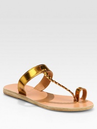 Channel your inner Goddess in this banded metallic leather silhouette with a braided t-strap and smooth toe ring. Stacked platform, ½ (15mm)Metallic leather upperLeather lining and soleMade in Greece Channel your inner Goddess in this banded metallic leather silhouette with a braided t-strap and smooth toe ring. Stacked platform, ½ (15mm)Metallic leather upperLeather lining and soleMade in Greece
