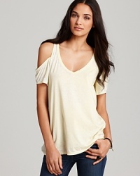 Cutout shoulders lend a hint of skin to this super-soft CHASER tee, tailored with a deep V-neck. Cutout shoulders lend a hint of skin to this super-soft CHASER tee, tailored with a deep V-neck.