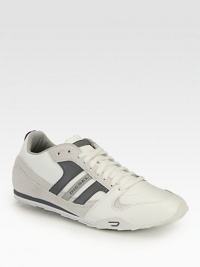 A high-performance sneaker with signature style, this lace-up constructed from leather and suede highlights impeccable stitching and a durable rubber sole, ensuring you'll stay on the right track of comfort and style .Leather/suede upperPadded insoleRubber soleImported A high-performance sneaker with signature style, this lace-up constructed from leather and suede highlights impeccable stitching and a durable rubber sole, ensuring you'll stay on the right track of comfort and style .Leather/suede upperPadded insoleRubber soleImported