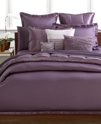A modern look rooted in luxe simplicity, this Haze sham from Donna Karan features a rich purple tone with a lustrous sheen. Finished with pure silk trim. Button closure. A modern look rooted in luxe simplicity, this Haze sham from Donna Karan features a rich purple tone with a lustrous sheen. Finished with pure silk trim. Button closure.