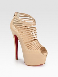 Sultry leather design with an ultra-high heel and hidden platform. Self-covered heel, 6¼ (160mm)Covered platform, 2½ (65mm)Compares to a 3¾ heel, (95mm)Leather upperBack zipLeather liningSignature red leather solePadded insoleMade in Italy Sultry leather design with an ultra-high heel and hidden platform. Self-covered heel, 6¼ (160mm)Covered platform, 2½ (65mm)Compares to a 3¾ heel, (95mm)Leather upperBack zipLeather liningSignature red leather solePadded insoleMade in Italy