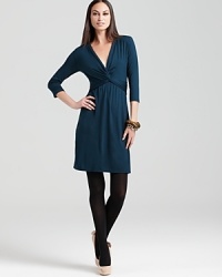 A wardrobe essential, this effortless DKNY dress flaunts a rich hue and timeless silhouette for an enduringly chic style. Team with pumps and go from desk to drinks with ease. A wardrobe essential, this effortless DKNY dress flaunts a rich hue and timeless silhouette for an enduringly chic style. Team with pumps and go from desk to drinks with ease.