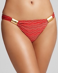 Go global with this bikini from L*Space, striking in an an on-trend tribal print. Hinting at exotic allure, this suit is sure to wow wherever your passport takes you. Go global with this bikini from L*Space, striking in an an on-trend tribal print. Hinting at exotic allure, this suit is sure to wow wherever your passport takes you.