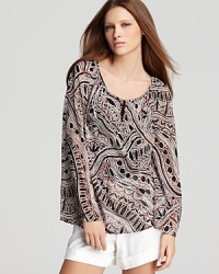 Bearing an abstract print on a sheer body, this Trina Turk top features a keyhole opening at the neckline with two small button closures. Layer it over a delicate camisole and pair it with a sleek pencil skirt for office polish. Bearing an abstract print on a sheer body, this Trina Turk top features a keyhole opening at the neckline with two small button closures. Layer it over a delicate camisole and pair it with a sleek pencil skirt for office polish.