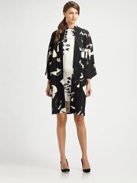 Made from merino wool and featuring an exceptional fit, a luxurious coat with easy appeal.BoatneckKimono sleevesAllover printRelaxed fitAbout 37 from shoulder to hemMerino woolDry cleanImported Model shown is 5'11 (180cm) wearing US size Small. Made from merino wool and featuring an exceptional fit, a luxurious coat with easy appeal.BoatneckKimono sleevesAllover printRelaxed fitAbout 37 from shoulder to hemMerino woolDry cleanImported Model shown is 5'11 (180cm) wearing US size Small.