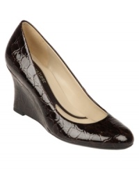 Subtle croc embossing adds a stylish edge to Naturalizer's Ashby pumps--a classic for your workday wardrobe. The wedge heel makes them comfortable and easy to wear from 9 to 5 and beyond. Also available in a smooth leather finish. Subtle croc embossing adds a stylish edge to Naturalizer's Ashby pumps--a classic for your workday wardrobe. The wedge heel makes them comfortable and easy to wear from 9 to 5 and beyond. Also available in a smooth leather finish.