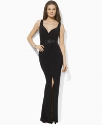 Lauren by Ralph Lauren's elegant evening gown flatters every curve in body-skimming matte jersey and is finished with an alluring V-neckline, feminine pleats and a sultry slit at the skirt Lauren by Ralph Lauren's elegant evening gown flatters every curve in body-skimming matte jersey and is finished with an alluring V-neckline, feminine pleats and a sultry slit at the skirt