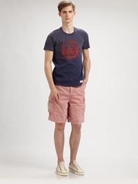 A warm weather essential, these ruggedly handsome cargo shorts are crafted in cool cotton and updated in a stately hue.Side slash, back flap pocketscargo pocketsStitched back flap pocketsInseam, about 10CottonMachine washMade in USA A warm weather essential, these ruggedly handsome cargo shorts are crafted in cool cotton and updated in a stately hue.Side slash, back flap pocketscargo pocketsStitched back flap pocketsInseam, about 10CottonMachine washMade in USA