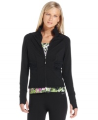 High-performance quality and chic style combine in this zip-up jacket from Calvin Klein Performance. High-performance quality and chic style combine in this zip-up jacket from Calvin Klein Performance.