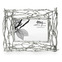 A triple-layer sculpture of twigs in this 4x6 frame creates dimension like no other frame. Makes a great presentation of your favorite photo. Collect different sizes to display a variety of pictures. A triple-layer sculpture of twigs in this 4x6 frame creates dimension like no other frame. Makes a great presentation of your favorite photo. Collect different sizes to display a variety of pictures.