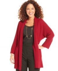 Warm up your look with NY Collection's long sleeve plus size cardigan-- it's an essential for the season! Warm up your look with NY Collection's long sleeve plus size cardigan-- it's an essential for the season!